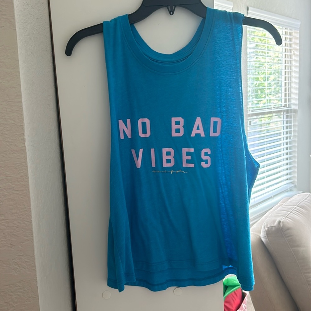Blue Sleeveless Top with Pink Lettering